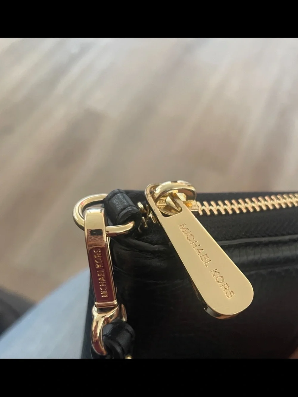 Michael Kors Black Leather Zip-Around Wallet with Gold MK Emblem